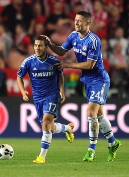 PRAGUE, CZECH REPUBLIC - AUGUST 30: Eden Hazard of Chelsea is congratulated by teammate Gary Cahill after scoring his side's second goal during the UEFA Super Cup match between Chelsea and Bayern Muenchen at Eden Stadium on August 30, 2013 in Prague, Czech Republic. (Photo by Chris Brunskill Ltd/Getty Images)