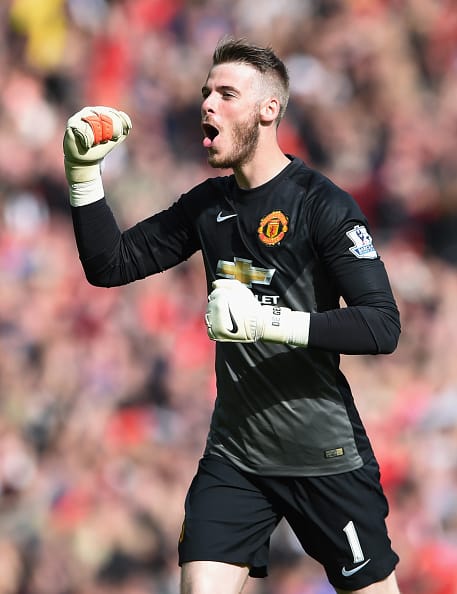 MANCHESTER, ENGLAND - OCTOBER 05: David De Gea of Manchester United celebrates his team's second goal during the Barclays Premier League match between Manchester United and Everton at Old Trafford on October 5, 2014 in Manchester, England. (Photo by Michael Regan/Getty Images)