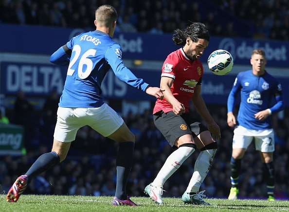 LIVERPOOL, ENGLAND - APRIL 26: Radamel Falcao of Manchester United in action with John Stones of Everton during the Barclays Premier League match between Everton and Manchester United at Goodison Park on April 26, 2015 in Liverpool, England. (Photo by Matthew Peters/Man Utd via Getty Images)