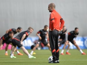 MUNICH, GERMANY - MAY 11: Coach Pep Guardiola of Bayern Munich attends a training session ahead the UEFA Champions League semi-final second leg match between Bayern Munich and FC Barcelona at the club's training ground on May 11, 2015 in Munich, Germany. (Photo by Lukas Barth/Anadolu Agency/Getty Images)