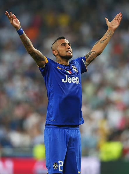 MADRID, SPAIN - MAY 13:  Arturo Vidal of Juventus celebates following his team's progression to the final during the UEFA Champions League Semi Final, second leg match between Real Madrid and Juventus at Estadio Santiago Bernabeu on May 13, 2015 in Madrid, Spain.  (Photo by Alex Livesey/Getty Images)