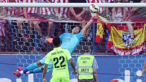 MADRID, SPAIN - MAY 17: Claudio Bravo, goalkeeper of FC Barcelona saves the ball during the La Liga match between Club Atletico de Madrid and FC Barcelona at Vicente Calderon Stadium on May 17, 2015 in Madrid, Spain. (Photo by Miguel Ruiz/FC Barcelona via Getty Images)