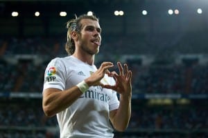 MADRID, SPAIN - AUGUST 29: Gareth Bale of Real Madrid CF celebrates scoring their fifth goal during the La Liga match between Real Madrid CF and Real Betis Balompie at Estadio Santiago Bernabeu on August 29, 2015 in Madrid, Spain. (Photo by Gonzalo Arroyo Moreno/Getty Images)