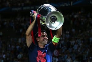 BERLIN, GERMANY - JUNE 6: Xavi of FC Barcelona lifts the trophy following the UEFA Champions League Final match between Juventus and FC Barcelona at the Olympiastadion on June 6, 2015 in Berlin, Germany. (Photo by Chris Brunskill Ltd/Getty Images)