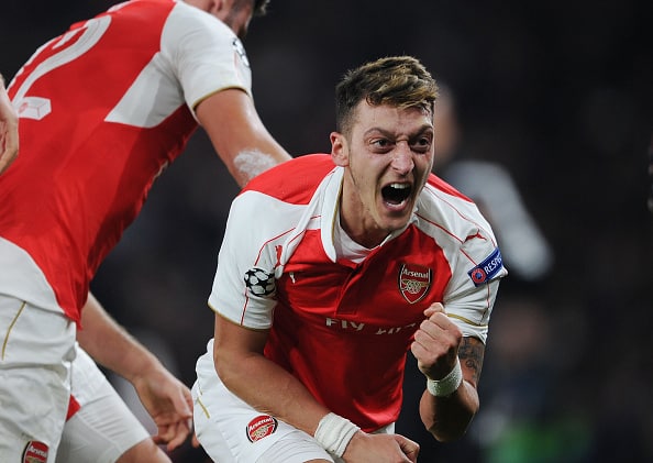 LONDON, ENGLAND - OCTOBER 20: Mesut Ozil celebrates scoring the 2nd Arsenal goal during the UEFA Champions League match between Arsenal and Bayern Munchen at Emirates Stadium on October 20, 2015 in London, United Kingdom. (Photo by Stuart MacFarlane/Arsenal FC via Getty Images)