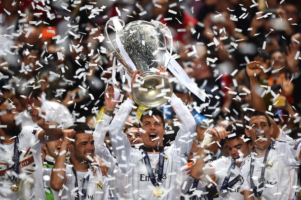 LISBON, PORTUGAL - MAY 24: Cristiano Ronaldo of Real Madrid lifts the Champions league trophy during the UEFA Champions League Final between Real Madrid and Atletico de Madrid at Estadio da Luz on May 24, 2014 in Lisbon, Portugal. (Photo by Laurence Griffiths/Getty Images)
