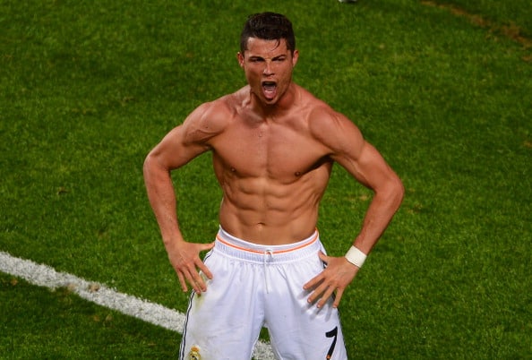 LISBON, PORTUGAL - MAY 24: Cristiano Ronaldo of Real Madrid celebrates scoring their fourth goal from the penalty spot during the UEFA Champions League Final between Real Madrid and Atletico de Madrid at Estadio da Luz on May 24, 2014 in Lisbon, Portugal. (Photo by Lars Baron/Getty Images)