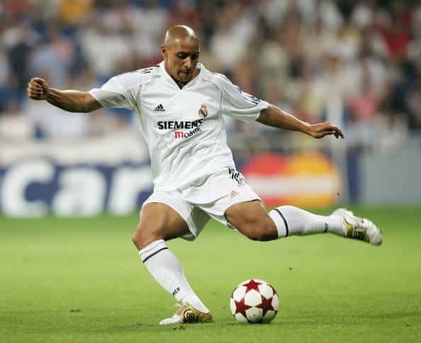 MADRID, SPAIN - SEPTEMBER 28: Roberto Carlos of Real Madrid in action during the UEFA Champions League Group B match between Real Madrid and Roma at the Santiago Bernabeu Stadium on September 28, 2004 in Madrid, Spain. (Photo by Shaun Botterill/Getty Images)