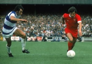 LONDON - AUGUST 16: Kevin Keegan of Liverpool looks to take the ball past Dave Clement of Queens Park Rangers during the League Division One match held on August 16, 1975 at Loftus Road, in London. Queens Park Rangers won the match 2-0. (Photo by Don Morley/Getty Images)