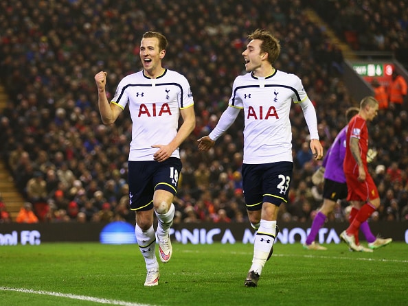 LIVERPOOL, ENGLAND - FEBRUARY 10:  Harry Kane of Tottenham Hotspur celebrates scoring his goal with Christian Eriksen during the Barclays Premier League match between Liverpool and Tottenham Hotspur at Anfield on February 10, 2015 in Liverpool, England.  (Photo by Clive Brunskill/Getty Images)