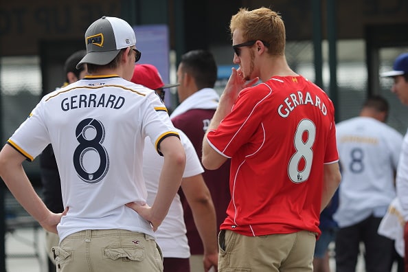 LOS ANGELES, CA - AUGUST 23:  Two fans of #8 Steven Gerrard of LA Galaxy wearing a Galaxy and Liverpool shirt outside the stadium before the MLS match between Los Angeles Galaxy and New York City FC at StubHub Center on August 23, 2015 in Los Angeles, California.  (Photo by Matthew Ashton - AMA/Getty Images)
