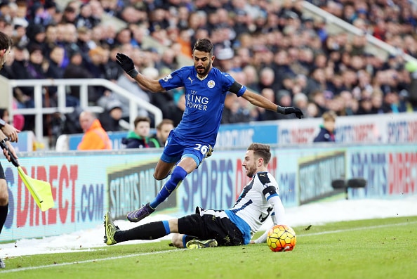 NEWCASTLE, ENGLAND - November 21: Riyad Mahrez of Leicester City skips past a tackle from Paul Dummett  of Newcastle United during the Premier League match between Newcastle United and Leicester City at St. James' Park on November 21, 2015 in Newcastle upon Tyne , United Kingdom.  (Photo by Plumb Images/Leicester City FC via Getty Images)