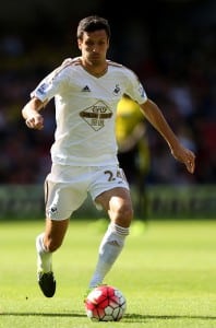 WATFORD, ENGLAND - SEPTEMBER 12: Jack Cork of Swansea in action during the Barclays Premier League match between Watford and Swansea City at Vicarage Road on September 12, 2015 in Watford, United Kingdom. (Photo by Ben Hoskins/Getty Images)