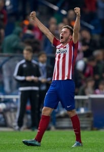 MADRID, SPAIN - OCTOBER 21:  Saul Niguez (2ndR) celebrates scoring their opening goal during the UEFA Champions League Group C match between Club Atletico de Madrid and FC Astana at Vicente Calderon stadium on October 21, 2015 in Madrid, Spain.  (Photo by Gonzalo Arroyo Moreno/Getty Images)