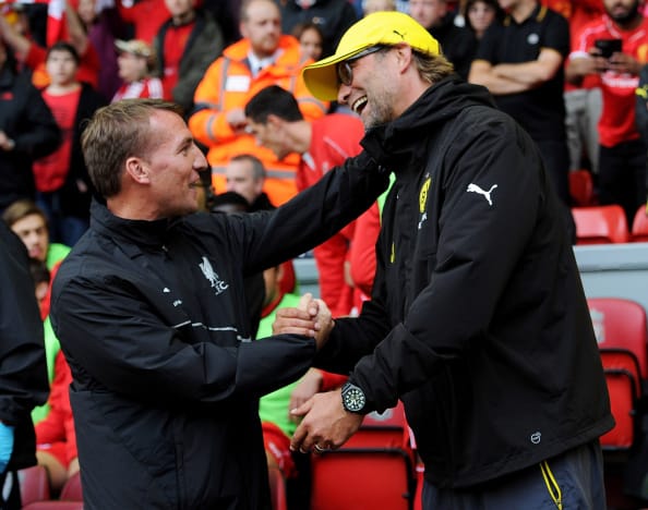 LIVERPOOL, ENGLAND - AUGUST 10: (THE SUN OUT, THE SUN ON SUNDAY OUT) Brendan Rodgers manager of Liverpool shakes hands with Borussia Dortmund manager Jurgen Klopp before the Pre Season Friendly match between Liverpool and Borussia Dortmund at Anfield on August 10, 2014 in Liverpool, England. (Photo by John Powell/Liverpool FC via Getty Images)