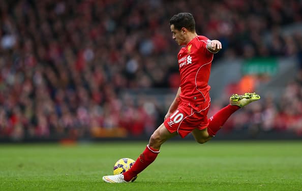 LIVERPOOL, ENGLAND - MARCH 01: Philippe Coutinho of Liverpool takes a shot at goal during the Barclays Premier League match between Liverpool and Manchester City at Anfield on March 1, 2015 in Liverpool, England. (Photo by Clive Brunskill/Getty Images)