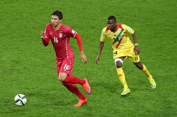 DUNEDIN, NEW ZEALAND - JUNE 03: Marko Grujic of Serbia is chased by Alassane Diallo of Mali during the FIFA U-20 World Cup New Zealand 2015 Group D match between Serbia and Mali at Otago Stadium on June 3, 2015 in Dunedin, New Zealand. (Photo by Robert Cianflone - FIFA/FIFA via Getty Images)