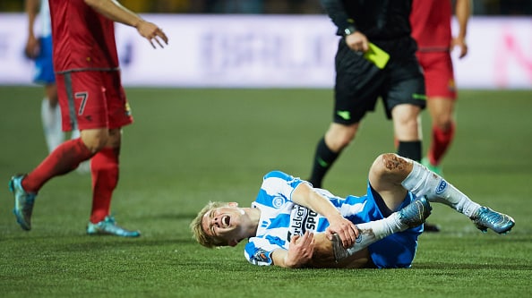 FARUM, DENMARK - OCTOBER 02: Mathias Greve of OB Odense gets injuried during the Danish Alka Superliga match between FC Nordsjalland and OB Odense at Farum Park on October 02, 2015 in Farum, Denmark. (Photo by Jan Christensen / FrontzoneSport via Getty Images)