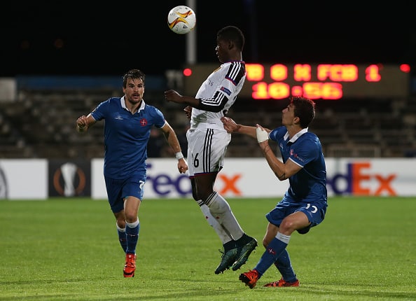 LISBON, PORTUGAL - NOVEMBER 5:  FC Basel 1893's forward Breel Embolo with Os Belenenses' forward Fabio Sturgeon in action during the UEFA Europa League match between Os Belenenses and FC Basel 1893 at Estadio do Restelo on November 5, 2015 in Lisbon, Portugal.  (Photo by Gualter Fatia/Getty Images)