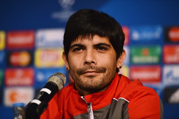 MOENCHENGLADBACH, GERMANY - NOVEMBER 24:  Ever Banega of Sevilla FC reacts during a press conference ahead of their UEFA Champions League Group D match against Borussia Moenchengladbach at Borussia-Park on November 24, 2015 in Moenchengladbach, Germany.  (Photo by Dennis Grombkowski/Bongarts/Getty Images)