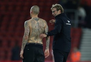 SOUTHAMPTON, ENGLAND - DECEMBER 02: Martin Skrtel of Liverpool has his tattoos on show as he talks to Jurgen Klopp manager of Liverpool after the Capital One Cup Quarter Final between Southampton and Liverpool at St Mary's Stadium on December 2, 2015 in Southampton, England. (Photo by Catherine Ivill - AMA/Getty Images)