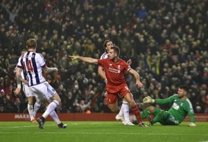 LIVERPOOL, ENGLAND - DECEMBER 13:  (THE SUN OUT, THE SUN ON SUNDAY OUT) Jordan Henderson of Liverpool celebrates the opening goal during the Barclays Premier League match between Liverpool and West Bromwich Albion at Anfield on December 13, 2015 in Liverpool, England.  (Photo by John Powell/Liverpool FC via Getty Images)