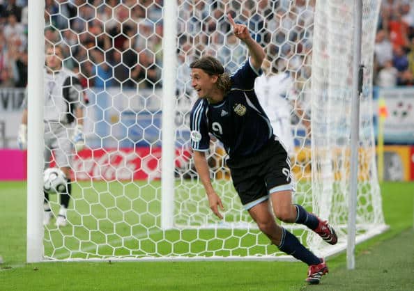 GELSENKIRCHEN, GERMANY - JUNE 16: Hernan Crespo of Argentina celebrates scoring a goal during the FIFA World Cup Germany 2006 Group C match between Argentina and Serbia & Montenegro at the Stadium Gelsenkirchen on June 16, 2006 in Gelsenkirchen, Germany. (Photo by Laurence Griffiths/Getty Images)