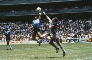 Sport, Football, 1986 Football World Cup, Mexico, Quarter Final, Argentina 2 v England 1, 22nd June, 1986, Argentina's Diego Maradona scores 1st goal with his Hand of God, past England goalkeeper Peter Shilton (Photo by Bob Thomas/Getty Images)