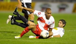 SAN MARINO, ITALY - JULY 27: Kieron Dyer of Queens Park Rangers is tackled by Luca Ricci of AC Cesena during the pre-season friendly match between AC Cesena and Queens Park Rangers on July 27, 2011 in San Marino, Italy. (Photo by Claudio Villa/Getty Images)